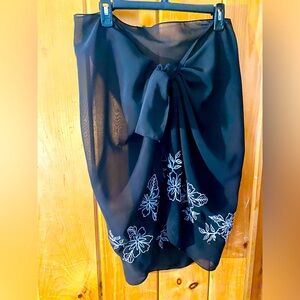 Sheer back bathing suit sarong with white embroidered flowers, very flattering!